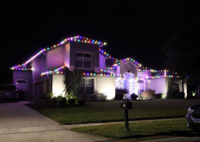 house with multi colored christmas lights